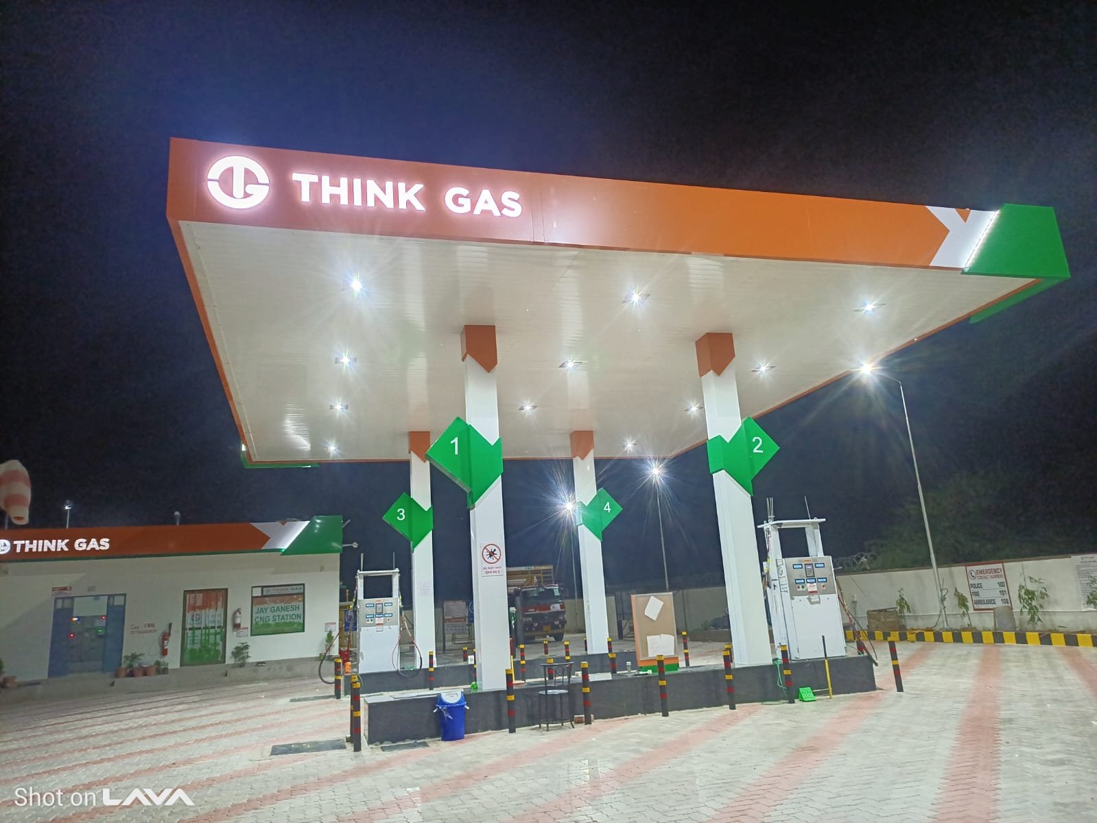 Think Gas CNG canopy at night by Arvind Engineering