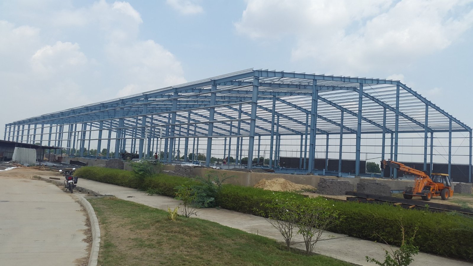 PEB steel frame exterior by Arvind Engineering
